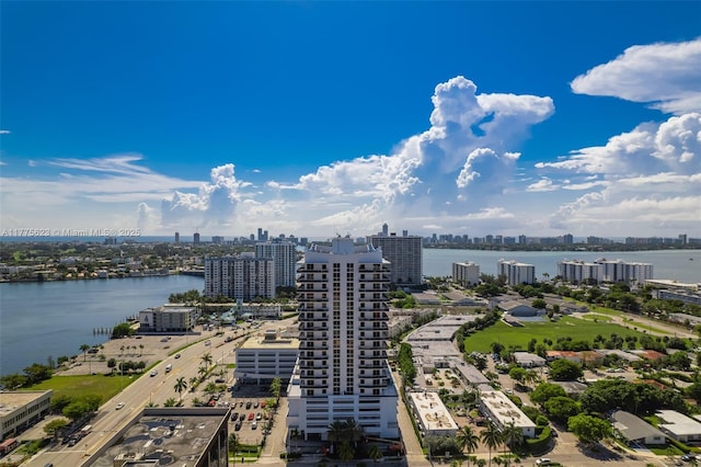aerial view featuring a water view and a view of city