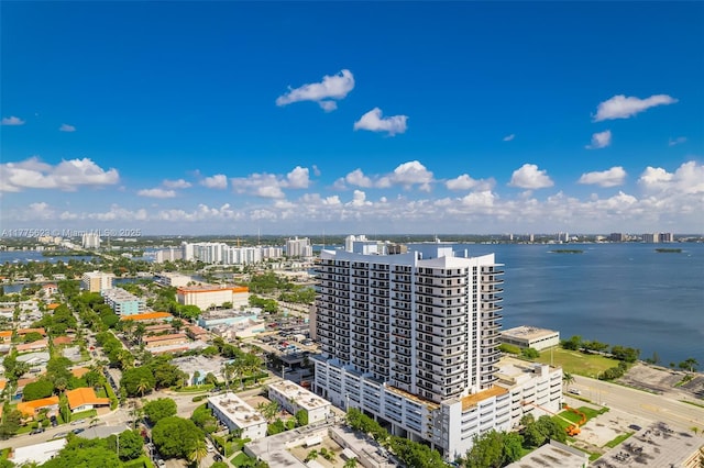 aerial view featuring a water view and a city view