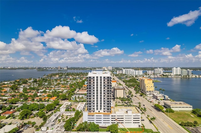 drone / aerial view with a water view and a city view