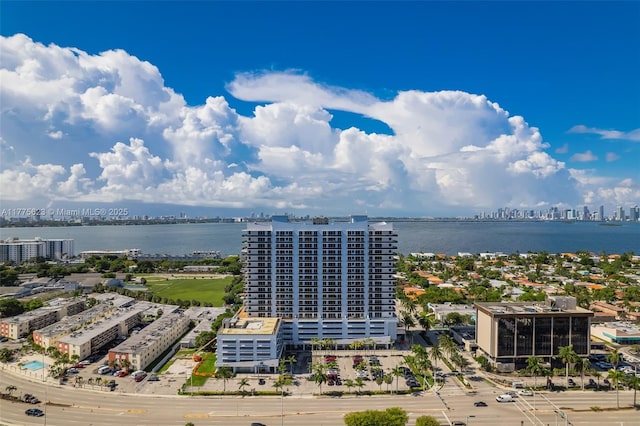 bird's eye view featuring a city view and a water view