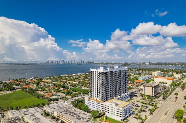 aerial view featuring a water view and a view of city