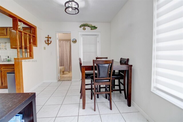 9215 SW 44th St, Miami, FL 33165 - dining area with light tile patterned floors and baseboards