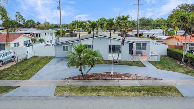 9215 SW 44th St, Miami, FL 33165 - single story home with fence, curved driveway, and a residential view