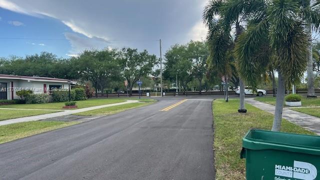 9380 SW 179th Ter, Palmetto Bay, FL 33157 - view of asphalt road featuring sidewalks