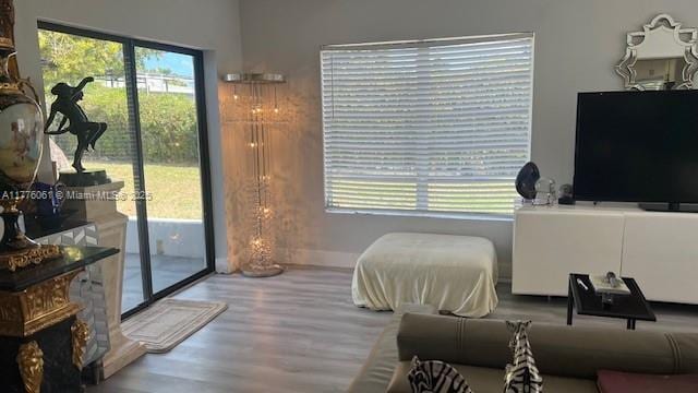 9380 SW 179th Ter, Palmetto Bay, FL 33157 - living room featuring wood finished floors and baseboards