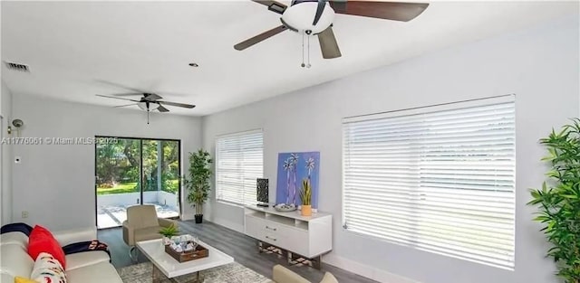 9380 SW 179th Ter, Palmetto Bay, FL 33157 - living room featuring a ceiling fan, baseboards, and wood finished floors