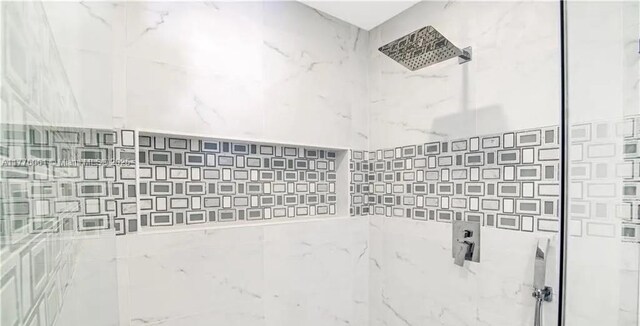 9380 SW 179th Ter, Palmetto Bay, FL 33157 - bathroom with tiled shower and decorative backsplash