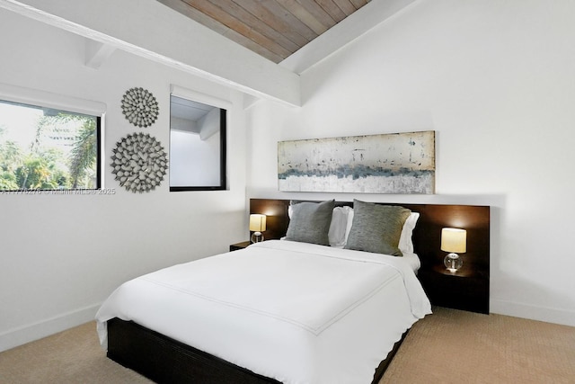3543 S Ocean Blvd Unit 103, South Palm Beach, FL 33480 - bedroom featuring carpet flooring, vaulted ceiling, and wooden ceiling