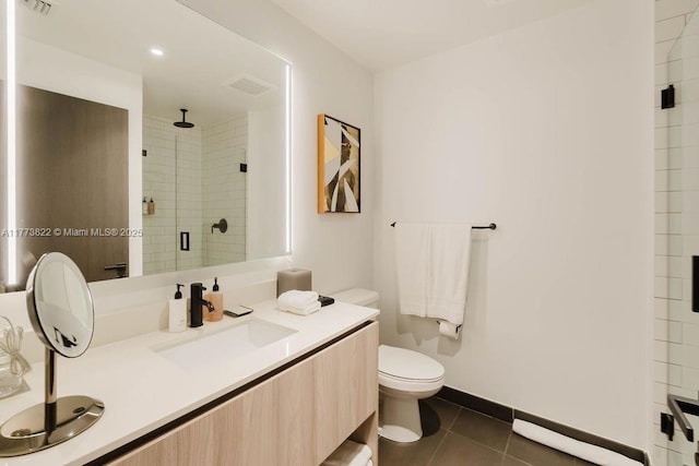 398 NE 5th St Unit 1408, Miami, FL 33132 - full bath with tile patterned flooring, vanity, toilet, baseboards, and a stall shower
