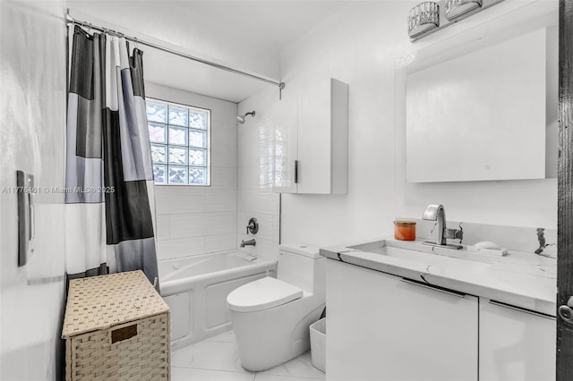 bathroom featuring marble finish floor, toilet, shower / bathtub combination with curtain, and vanity