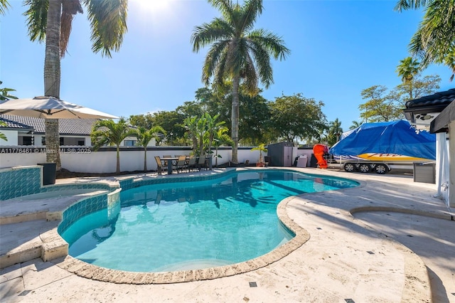 view of pool with a fenced backyard, a fenced in pool, and a patio