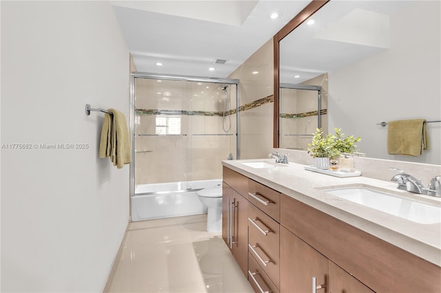 1950 S Ocean Dr Unit 14H, Hallandale Beach, FL 33009 - bathroom with combined bath / shower with glass door, double vanity, toilet, and a sink