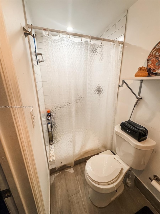 15809 SW 65th Ter, Miami, FL 33193 - full bath featuring toilet, shower / bath combo with shower curtain, and wood tiled floor