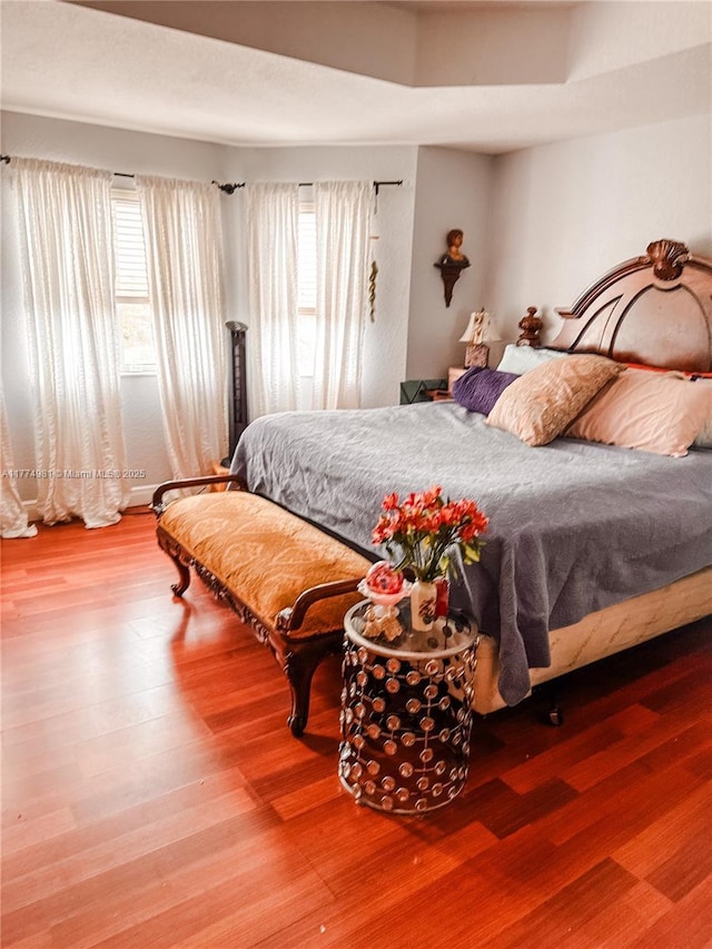 15809 SW 65th Ter, Miami, FL 33193 - bedroom featuring multiple windows and wood finished floors