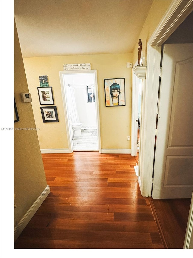 15809 SW 65th Ter, Miami, FL 33193 - hallway with baseboards and wood finished floors