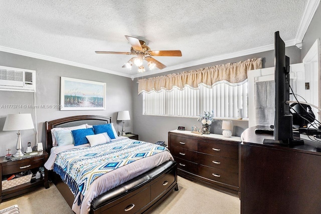 bedroom featuring ceiling fan, a textured ceiling, a wall unit AC, and crown molding