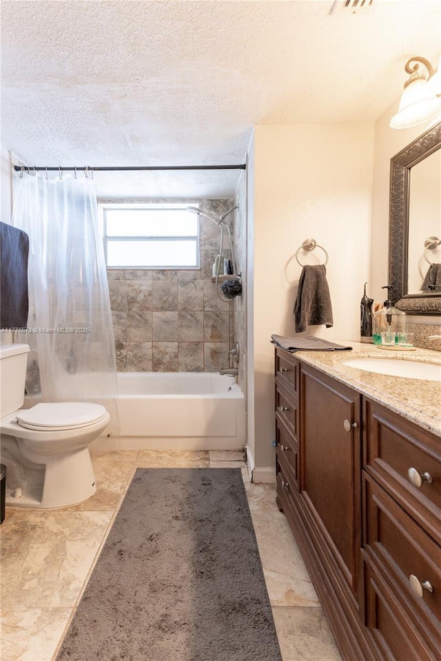 1680 NE 191st St Unit 307-2, Miami, FL 33179 - full bathroom with vanity, bathtub / shower combination, toilet, a textured ceiling, and baseboards