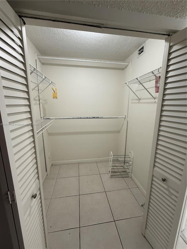 8335 SW 152nd Ave Unit B-106, Miami, FL 33193 - spacious closet with light tile patterned flooring