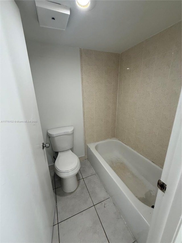 8335 SW 152nd Ave Unit B-106, Miami, FL 33193 - bathroom featuring tile patterned floors and a tub to relax in