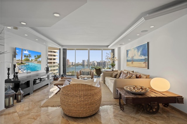living room with expansive windows, crown molding, a raised ceiling, marble finish floor, and recessed lighting