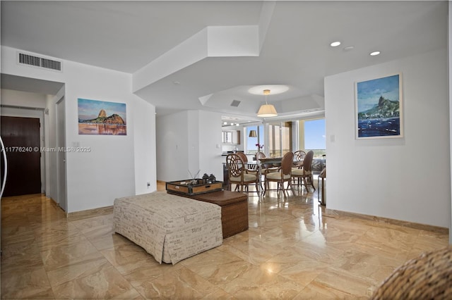 living area with marble finish floor, recessed lighting, baseboards, and visible vents
