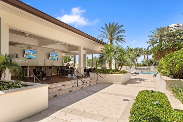 view of patio / terrace featuring an outdoor pool