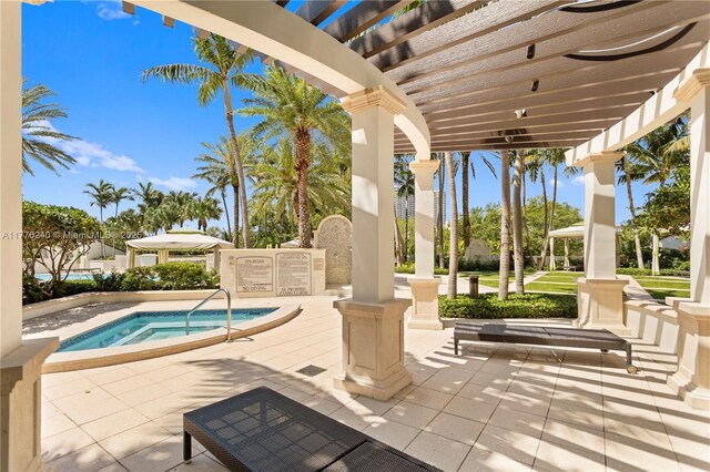 view of patio with a hot tub