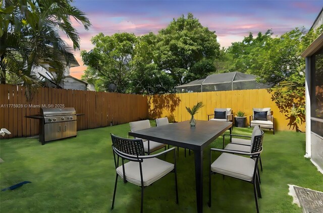 view of patio / terrace featuring a fenced backyard and grilling area