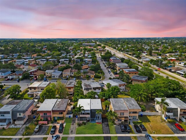 aerial view at dusk with a residential view