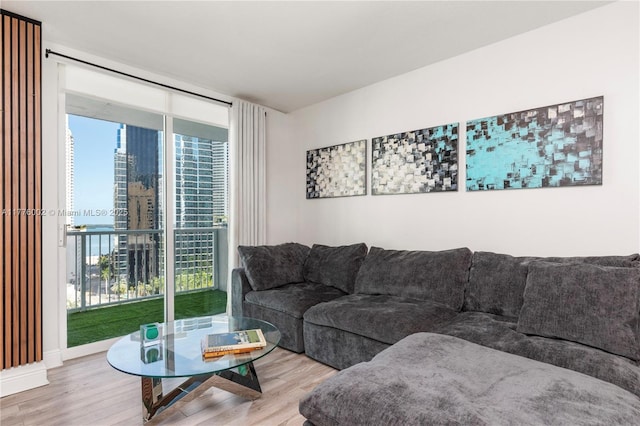 1250 S Miami Ave Unit 1206, Miami, FL 33130 - living room featuring wood finished floors and baseboards