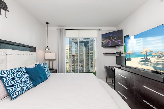 1250 S Miami Ave Unit 1206, Miami, FL 33130 - bedroom featuring access to exterior and a desk