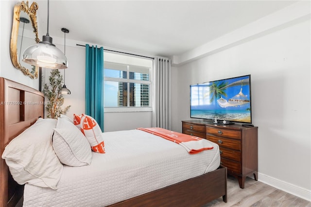 1250 S Miami Ave Unit 1206, Miami, FL 33130 - bedroom featuring light wood-type flooring and baseboards