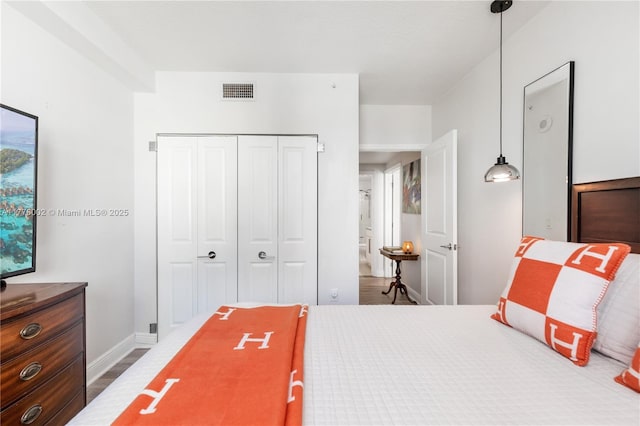 1250 S Miami Ave Unit 1206, Miami, FL 33130 - bedroom with baseboards and a closet