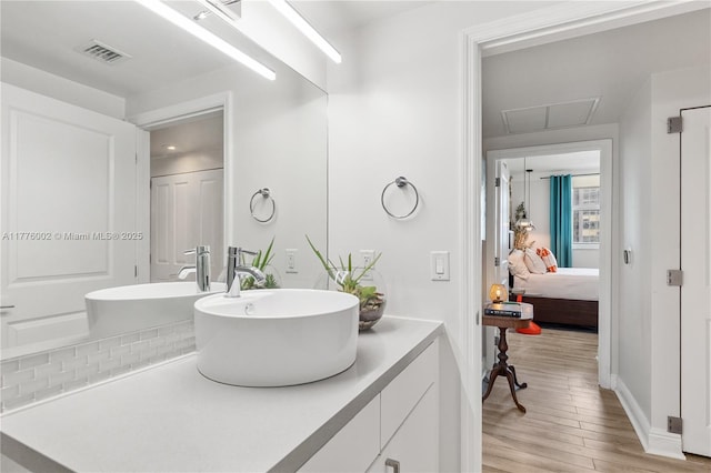1250 S Miami Ave Unit 1206, Miami, FL 33130 - bathroom featuring vanity, wood finished floors, and ensuite bath