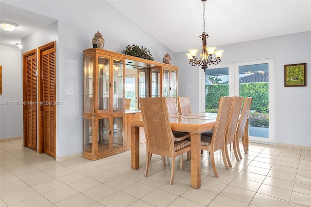 11472 SW 28th Ter, Miami, FL 33165 - dining area with a chandelier, light tile patterned flooring, lofted ceiling, and baseboards