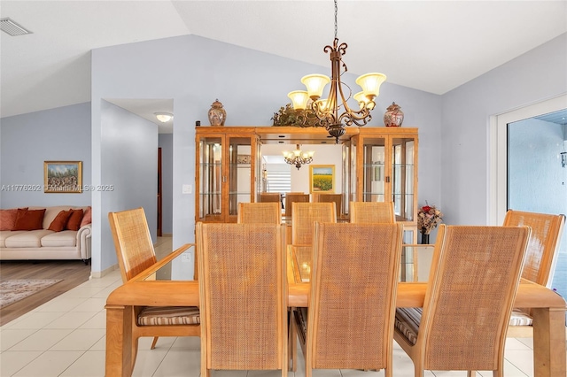 11472 SW 28th Ter, Miami, FL 33165 - dining room with a chandelier, lofted ceiling, and light tile patterned floors