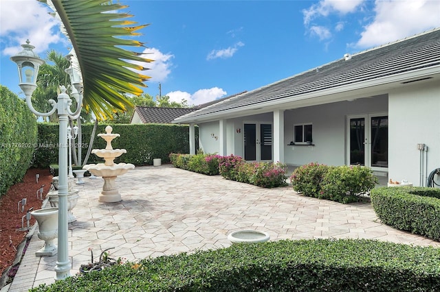 11472 SW 28th Ter, Miami, FL 33165 - view of patio / terrace with french doors