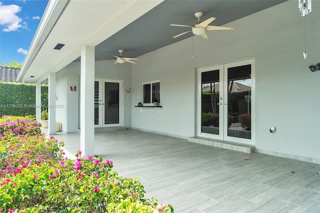 11472 SW 28th Ter, Miami, FL 33165 - wooden terrace featuring french doors, a ceiling fan, and a patio