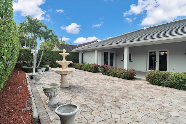 11472 SW 28th Ter, Miami, FL 33165 - view of patio featuring french doors and fence