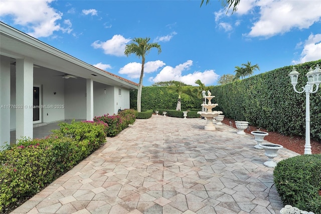 11472 SW 28th Ter, Miami, FL 33165 - view of patio / terrace featuring a ceiling fan and a fenced backyard