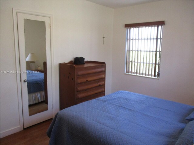 105 NW 32nd Pl, Miami, FL 33125 - bedroom featuring wood finished floors