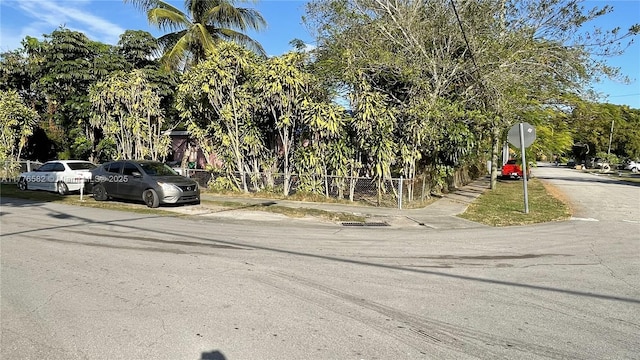 view of street with sidewalks and traffic signs