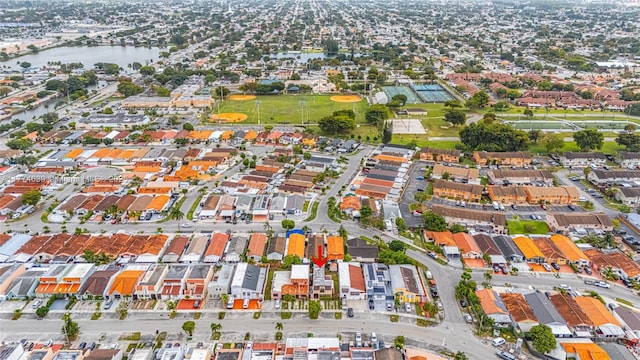 aerial view with a residential view and a water view