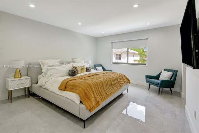 bedroom featuring baseboards, recessed lighting, and light tile patterned floors