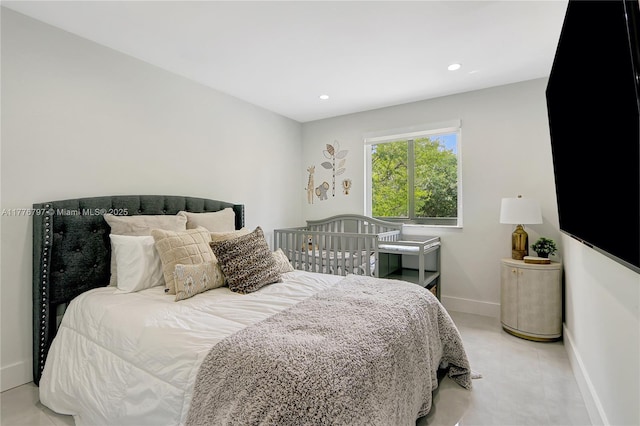 bedroom featuring baseboards and recessed lighting