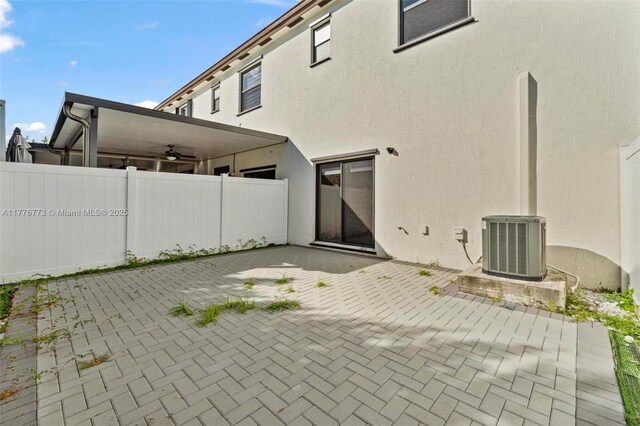 10861 W 32nd Ln Unit 10861, Hialeah, FL 33018 - view of patio featuring cooling unit and fence