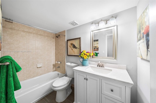 13131 Ixora Ct Unit A-1 A-2 A-3, North Miami, FL 33181 - full bath featuring visible vents, washtub / shower combination, toilet, vanity, and wood finished floors