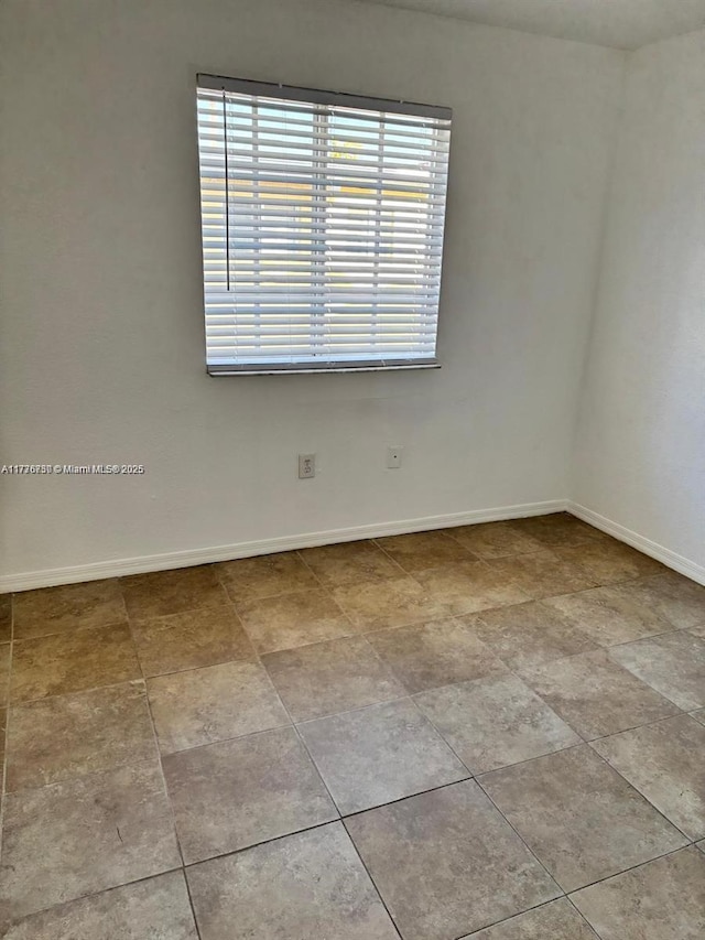 2062 NE 167th St Unit 3-112, North Miami Beach, FL 33162 - unfurnished room with baseboards