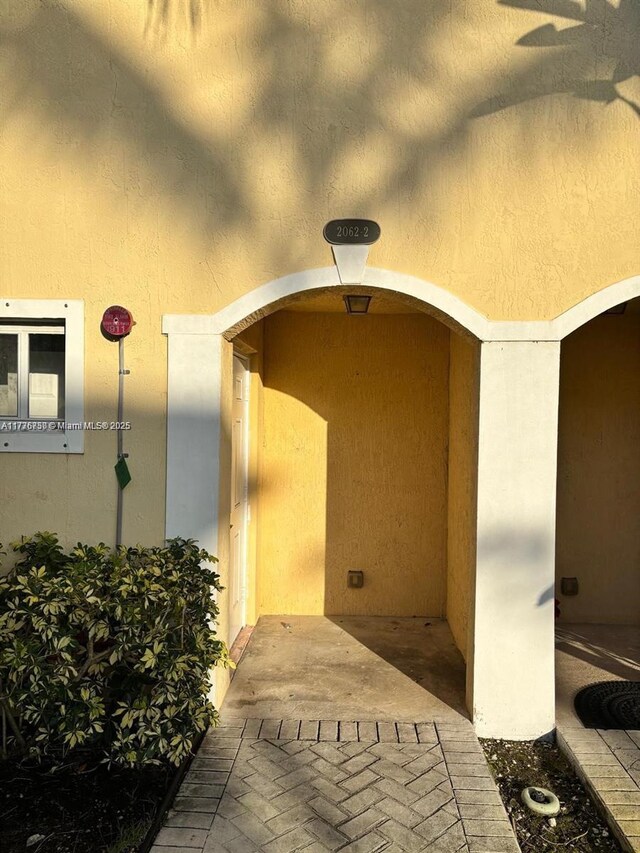 2062 NE 167th St Unit 3-112, North Miami Beach, FL 33162 - property entrance with stucco siding
