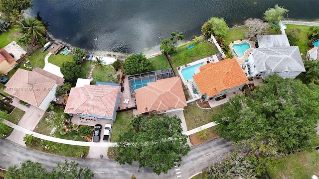 drone / aerial view with a water view